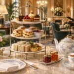 Meghan Markle and Malala Yousafzai Team Up: As Ever Jam and Tea Sales Will Benefit the Malala Fund Editorial illustration of an afternoon tea table with a teapot, scones and jam. Not a photo of Meghan Markle, Malala Yousafzai or the actual event.
