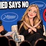Amanda Seyfried Says She Passed on a TV Role Because of Its Sex Scenes Hand-drawn editorial cartoon of Amanda Seyfried on a festival panel stage crossing her arms to say no, beside a moderator, with a crossed-out clapperboard. Headline: Seyfried Says No. Illustration, not a photograph.